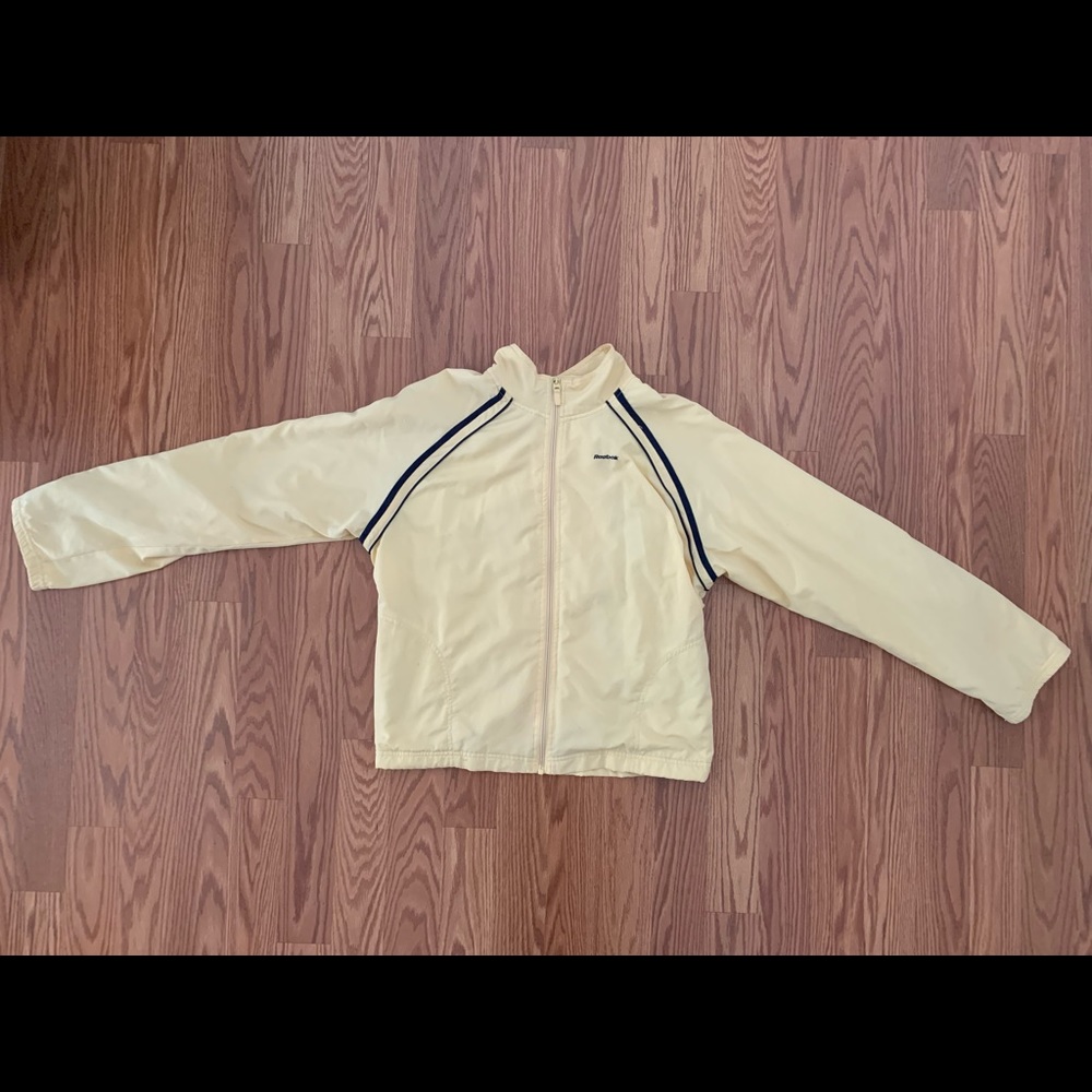 Yellow Reebok light windbreaker